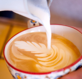 Latte Art in a colourful coffee cup